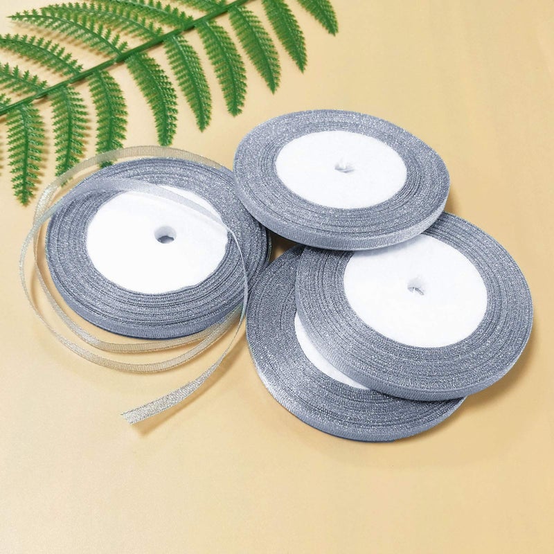 Oubaka 4 Roll Christmas Glitter Metallic Silver Ribbon,Glitter Ribbon for Gift Crafters Wedding Party Birthday Wrap Hair Bows Floral Projects Wrapping Decorations DIY Crafts Arts(1/4inX22m) - Image 1